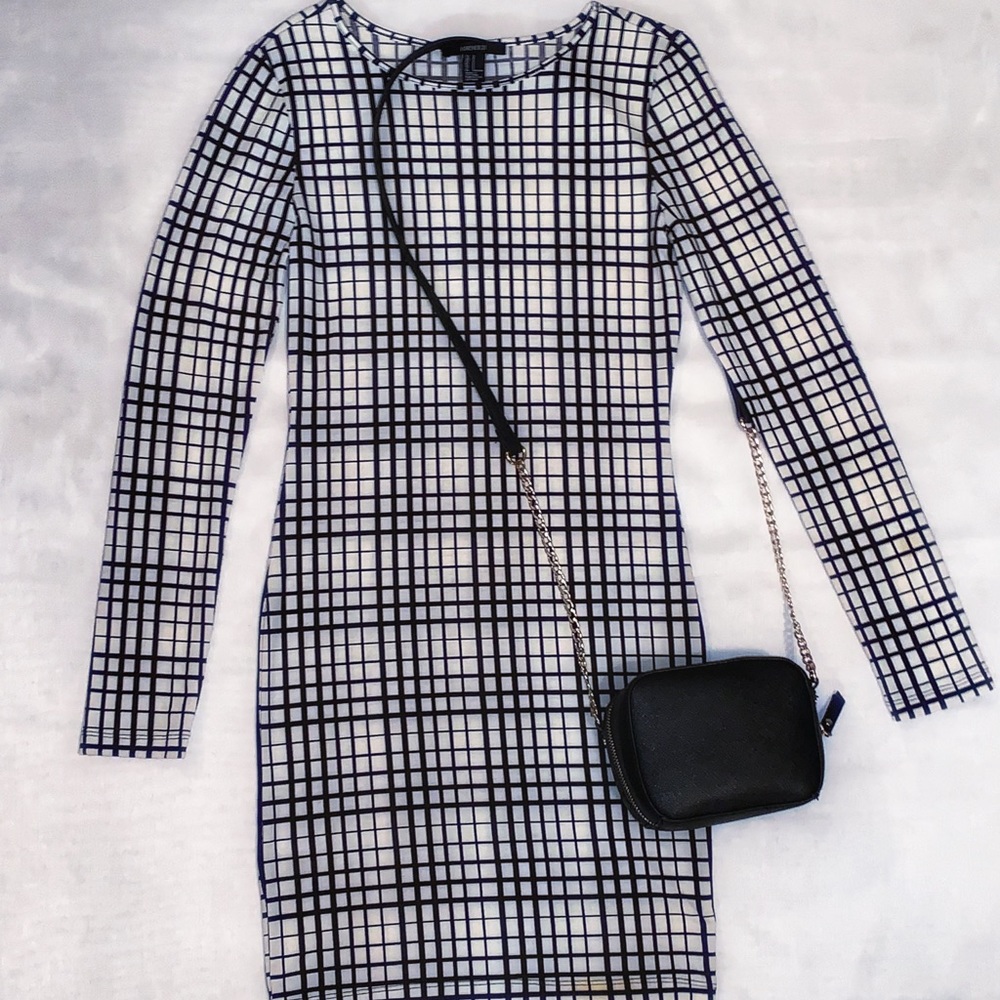 White dress with black stripes.